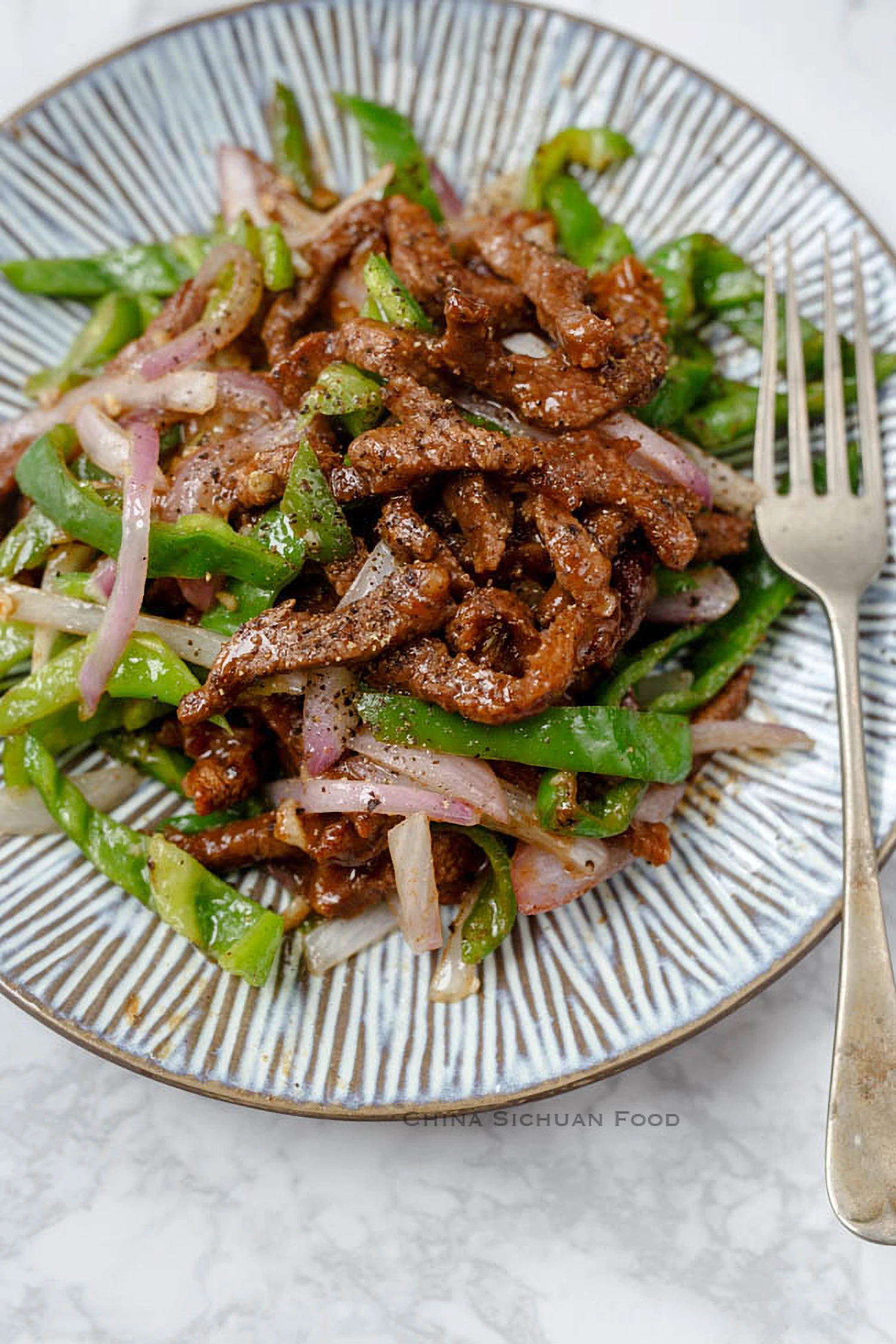 Black Pepper Beef Stir Fry|chinasichuanfood.com